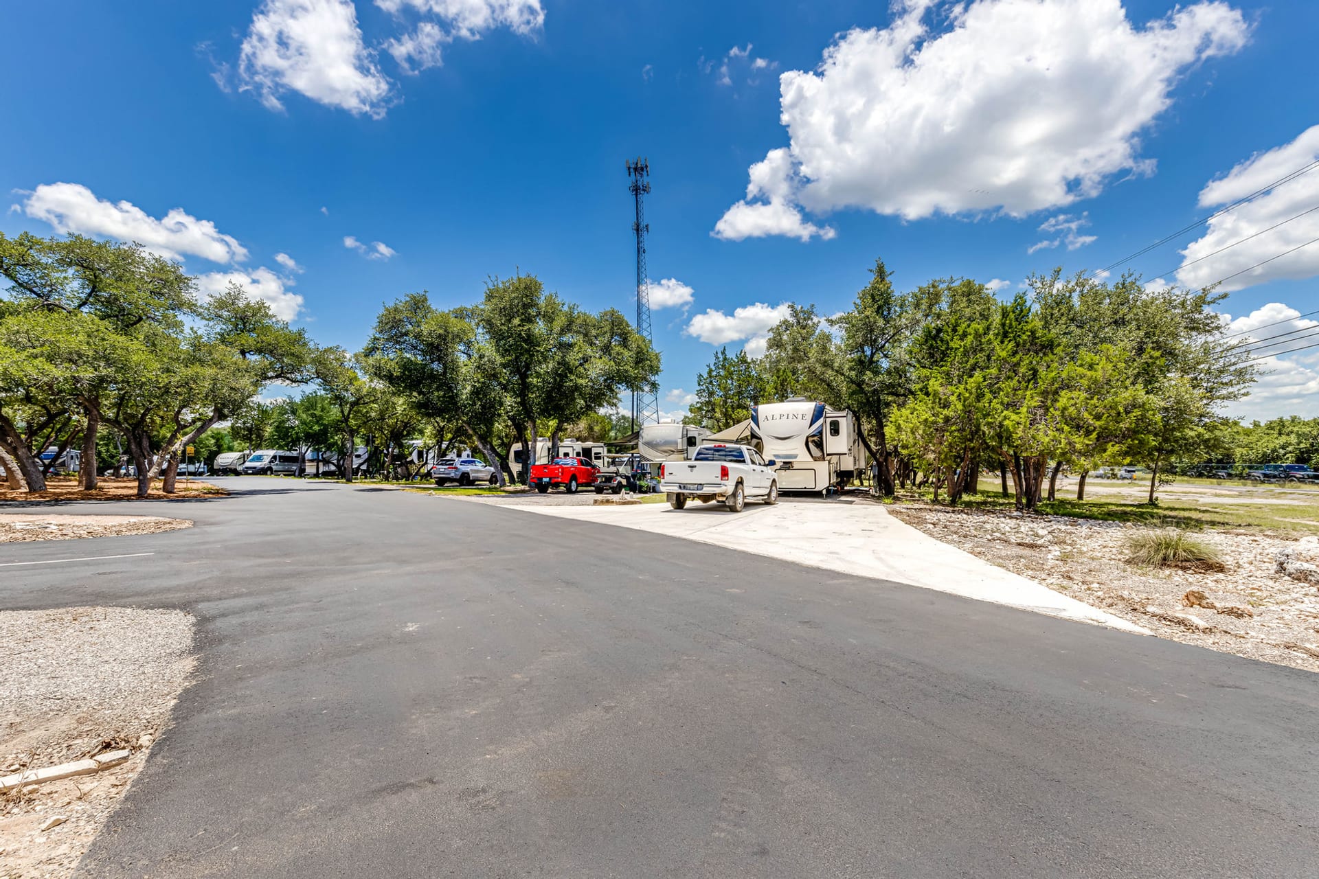 Spacious Pull-Through Sites — Sienna Ridge RV Park, Canyon Lake, Texas